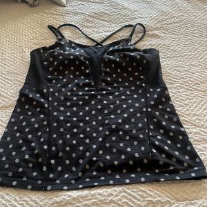 Black and white polka dot Lululemon yoga tank.
